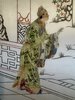 Another image of A postage stamp collage depicting a Chinese court scene. by [ANON]